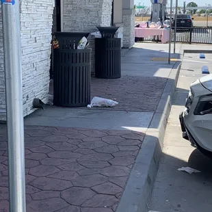 All around the trash is just like here in the front - not one of them will come clean it up either !   Disgusting !