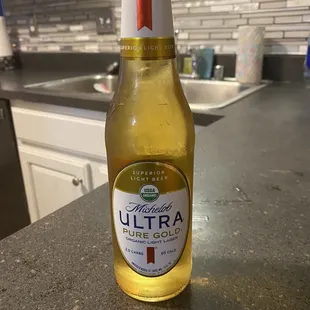 a bottle of ultra pure gold