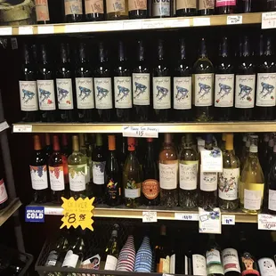 a variety of wines on shelves