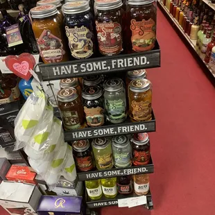 a display of jars of liquor