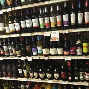 a variety of wines on shelves