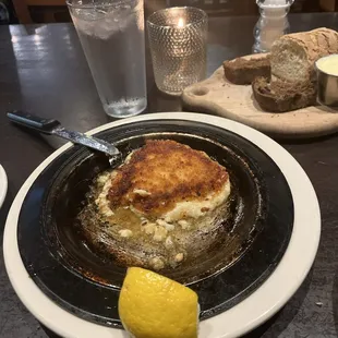 a plate of food and a lemon