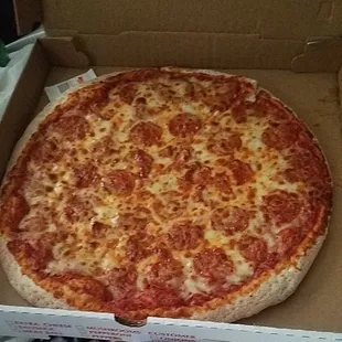 a pepperoni pizza in a box