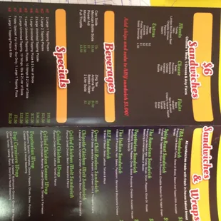 Sandwiches wraps &amp; salads- New menu. White menu is the old menu.