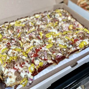 Deep dish: sausage, mushroom, banana peppers and onion.