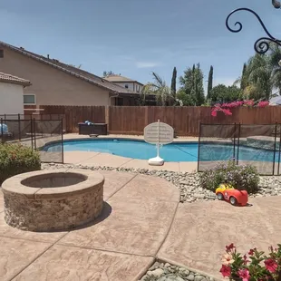 Often, we customize the installation. This customer wanted to enjoy the fire pit with the guys...
So we added a fencing fold-back feature.