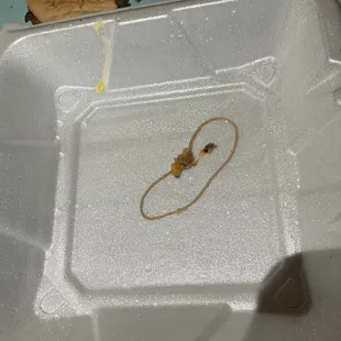 Rubber band found inside brisket baked potatoe.