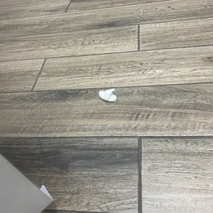 Used pad from previous patient in room, unsanitary and disgusting.