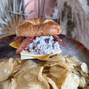 The Heritage chicken salad, croissant paired with deep river chips