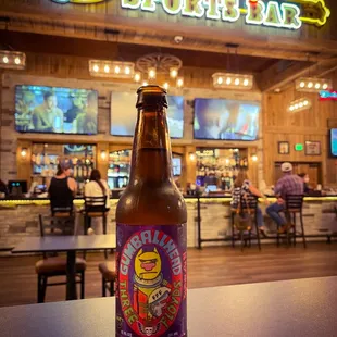 a bottle of beer on a table