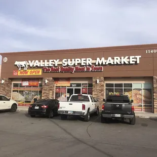 cars parked in front of the store