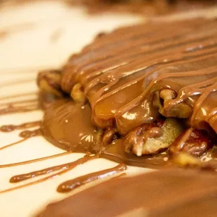 Pecan Patties: Homemade Butter Caramel, Roasted Salted Pecans, and Belgium Chocolate.