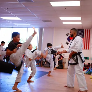 Mr. Smith warming up the students