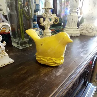 Ceramic yellow duck on a nest