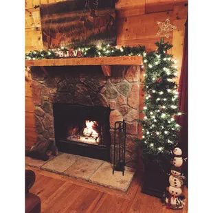 The Christmas decorations around the fireplace