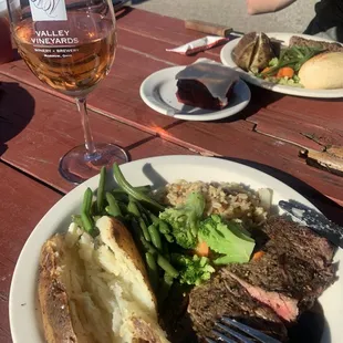 "Cookout" meal - steak grilled by yours truly, baked potato green beans, steamed broccoli and rice pilaf. Iced sangria top left