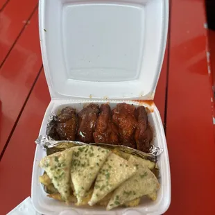 The Daily Special (M-F 11:00am-3:00pm)  Five wings or three tenders with fries and bread!