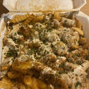 a close up of a box of fries