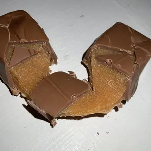 Inside milk chocolate coated caramel