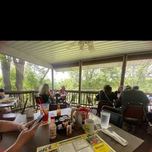 Screened in deck seating area.  Pretty awesome!