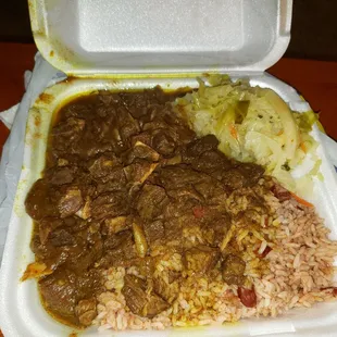Large Curry goat with cabbage rice &amp; beans