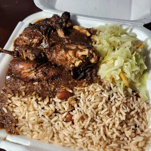 Jerk chicken, cabbage,Rice n beans. Asked for Xtra jerk sauce on rice n beans and didn't really come out that way...mild cabbage