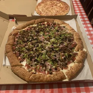 Goliath deluxe vs xl cheese pizza