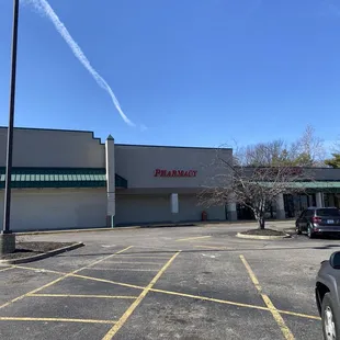 a parking lot in front of a store