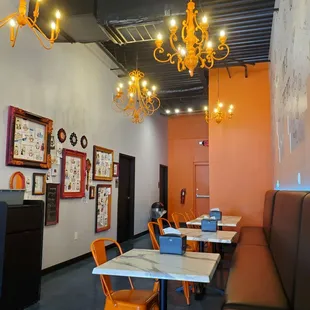 Interior tables at the rear of the dessert shop