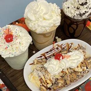 three desserts on a tray