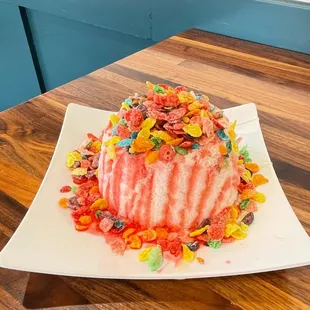 a cake with gummy candies on it