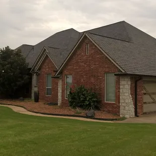 a brick house with a garage