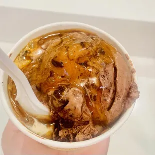 Dark Chocolate Fudge Brownie and Ice Cream Cake with caramel sauce