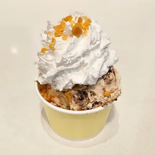 Vegan pb honeycomb brownie and cranberry crumble with vegan whip cream and honey comb candy