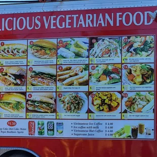 a menu on the side of a food truck
