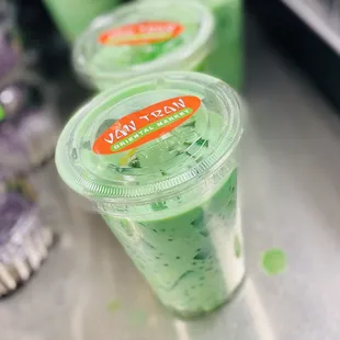 three cups of green smoothie