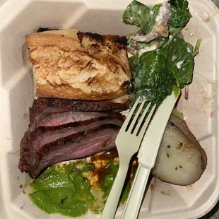 Tri tip plate, roasted potato, spinach salad mix, and 2 sauces