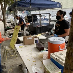 a woman holding up a sign