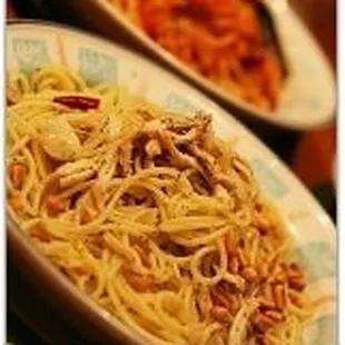 a plate of spaghetti and beans