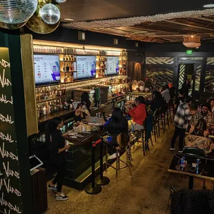 people sitting at the bar