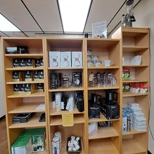 Inside the store - Bags of coffee, home brewers, drinkware, scales, coffee filters, whip cream dispenser