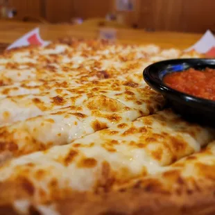 a pizza with cheese and sauce