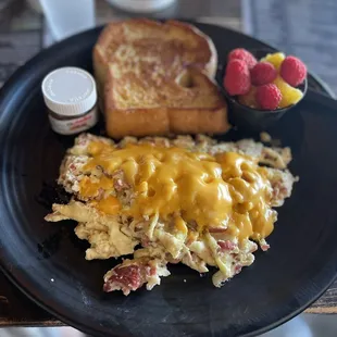 Sunrise deluxe minus the whipped cream and powdered sugar and fruits on the side.