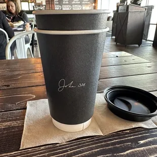a cup of coffee on a table