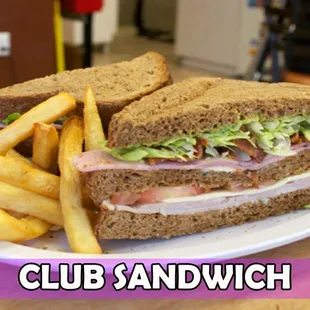 a club sandwich and french fries