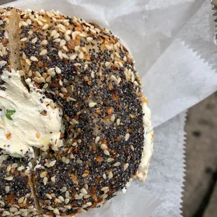 a bagel with cream cheese on it