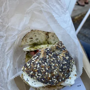 Everything bagel with tomato, mozzarella and pesto