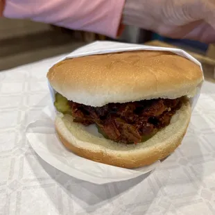 Chopped barbecue brisket sandwich with tea and chips $8