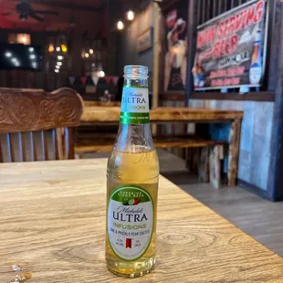 a bottle of beer on a table