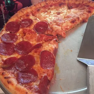 The pizza tastes just as good as it looks. So so so so so good.